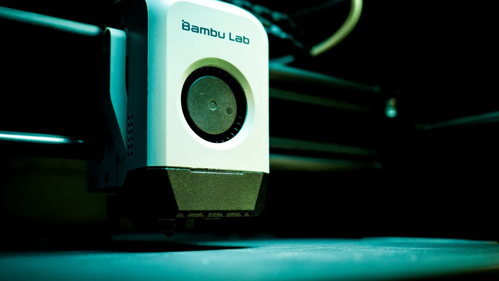 Close-up of a 3D printer extruder laying molten filament